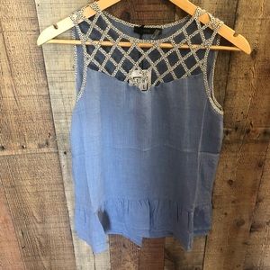 NWT SLEEVELESS CRISS CROSS TOP